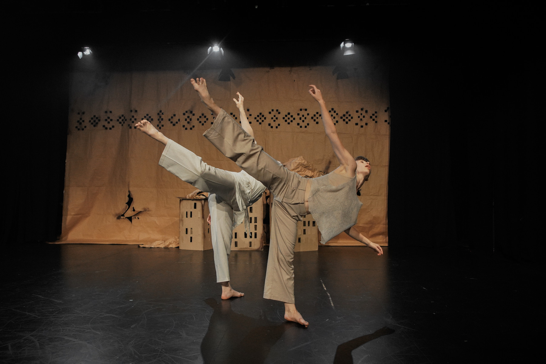 A wide ensemble scene from The Hollow Land